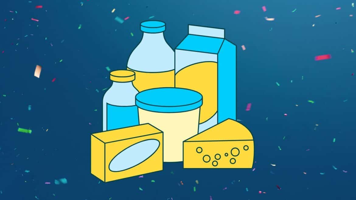 Ilustración de varios productos lácteos -cartón de leche, botellas, envase de yogur, cuña de queso y bloque de mantequilla- sobre un fondo azul con confeti, que refleja preocupaciones alimentarias crecientes como la presencia de microplásticos.